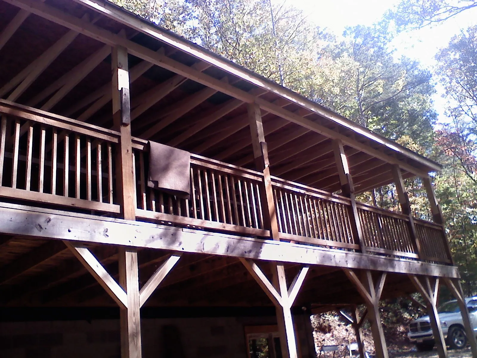 Timber framing under a new elevated porch and deck — Roof Leak Repair in Gilchrist by Roofing Brothers